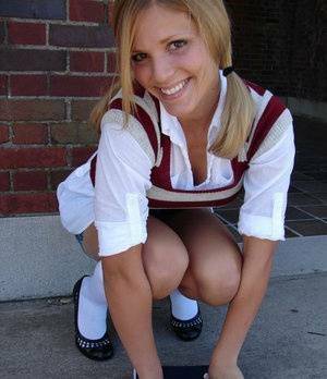 Blonde student Karen exposes her white underwear during upskirt action on fanspics.com