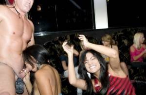 Hot chicks getting naked and sucking on strippers' cocks at the wild party on fanspics.com
