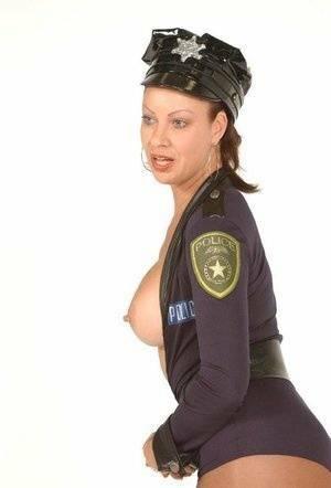 Playful MILF Vanessa Videl wears her slutty police uniform and shows off her on fanspics.com