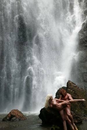 Stunning milf Jesse Jane fucks outdoor in the waterfall on cam on fanspics.com