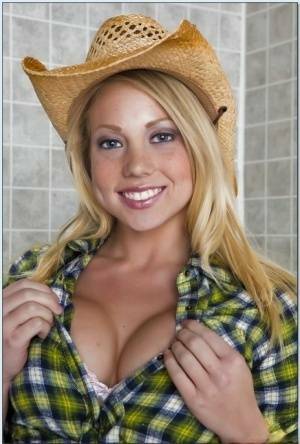 Blond teen babe in a cowboy hat Shawna Lenee goes nude in the shower on fanspics.com