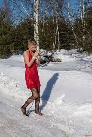 White female is toed up and forced to stand and kneel in snow on fanspics.com