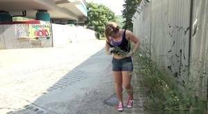 White girl pulls down her panties before squatting for a piss on country road on fanspics.com