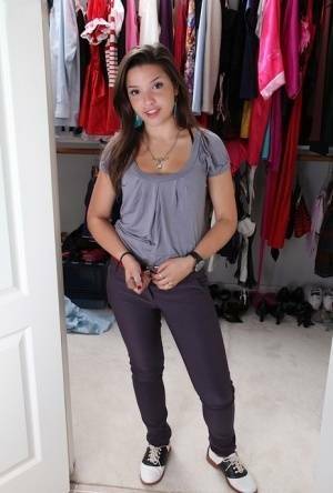 Sweet teenage amateur undressing and spreading her legs in changing room on fanspics.com