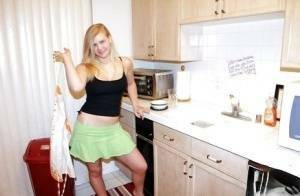 Fuckable blonde amateur Roxy Lovette slowly getting rid of her clothes on fanspics.com