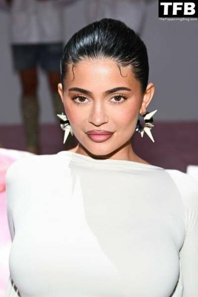 Kylie Jenner Flaunts Her Curves in a White Dress During Paris Fashion Week on fanspics.com