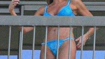 Luciana Gimenez Relaxes in a Blue Bikini on the Balcony of Her Hotel in Rio de Janeiro on fanspics.com