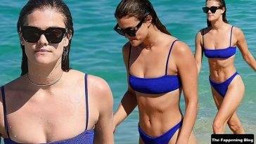 Nina Agdal Stuns in a Blue Bikini as She Goes For a Dip in the Ocean on fanspics.com