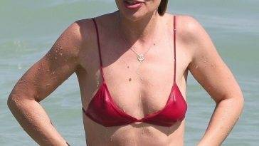 Melissa Cohen Looks Fit and Fabulous in a Tiny Red Bikini as She Relaxes in Rio de Janeiro on fanspics.com