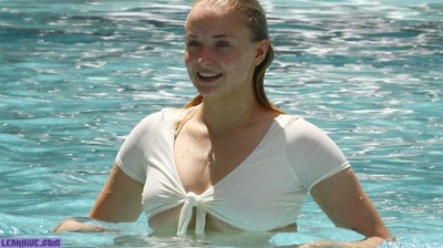 Sophie Turner caught in a bikini and wet flannel on fanspics.com