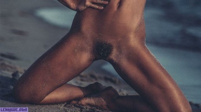 Marisa Papen showing her hairy pussy on the beach on fanspics.com