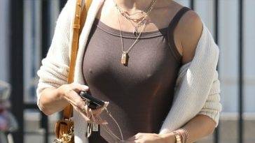 Alessandra Ambrosio Reveals Her Assets Under a Brown Tank as She Arrives at a Shoot in LA on fanspics.com