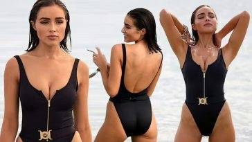 Olivia Culpo Looks Stunning in a Black Swimsuit on the Beach in Miami on fanspics.com