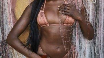Duckie Thot Sexy 13 Sports Illustrated Swimsuit 2022 on fanspics.com