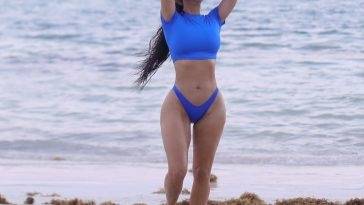 Kim Kardashian Shows Off Her Sensational Curves on the Beach on fanspics.com