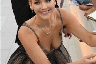 Jennifer Lawrence Bends Down To Show Her Fans Her Boobs on fanspics.com