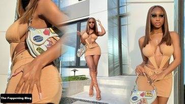 Normani Showcases Her Sexy Tits & Legs as She Poses in a Skimpy Dress on fanspics.com