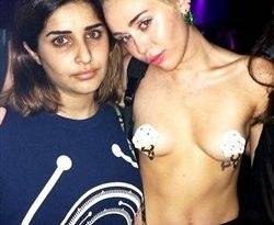 Miley Cyrus Topless With Pasties On At A Rave on fanspics.com