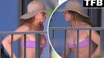 Jennifer Aniston Enjoys Some Downtime on Her Lanai Between Filming in Hawaii on fanspics.com