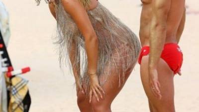 Rita Ora Looks Sensational as She Channels Baywatch in a Beautiful Dress on Sydney Beach on fanspics.com