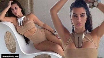 Kim Kardashian Shows Off Her Curves in a Monokini on fanspics.com