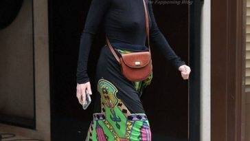 Milla Jovovich Shows Off Her Tits in Paris on fanspics.com