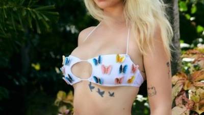 Lottie Moss Poses Up a Storm as She Stuns in a Butterfly PLT Bikini on fanspics.com