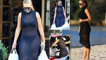Rita Ora Looks Hot in a Sexy Black Sheer Dress in Sydney on fanspics.com
