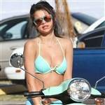 Selena Gomez Slutty Bikini On A Scooter Pics on fanspics.com