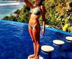 Nina Dobrev Tans In A Bikini Then Shows It Off In A Mini Dress on fanspics.com