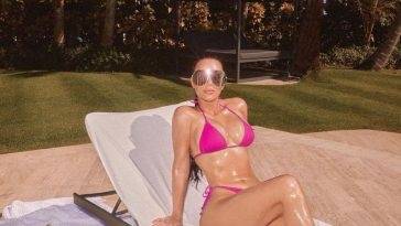 Kim Kardashian Poses in a Tiny Bikini on fanspics.com