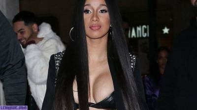 Cardi B showing off her beautiful cleavage on the streets of London on fanspics.com