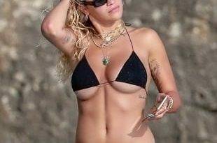 Rita Ora Ample Under Boob Bikini Pics on fanspics.com