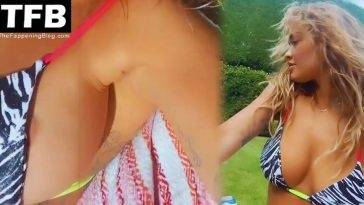 Rita Ora Flashes Her Areola in a Tiny Bikini (18 Nude & Sexy Pics + Videos) on fanspics.com