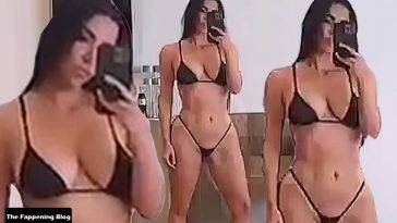 Kim Kardashian Shows Off Her Curves in a Micro Bikini (7 Pics + Video) on fanspics.com