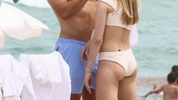 Mason Rudolph Tends to Genie Bouchard 19s Injury During a Romantic Break at the Beach on fanspics.com