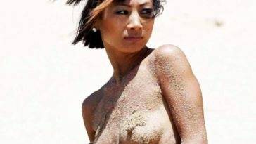 Actress Bai Ling Flashes her Nipples on the Beach in Hawaii on fanspics.com