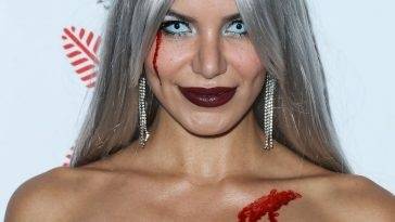 Madison Grace Poses on the Red Carpet at the CARN*EVIL Halloween Party in Bel Air on fanspics.com