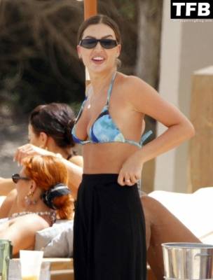 Emma Milton Shows Off Her Luscious Figure at the Beach in Ibiza on fanspics.com