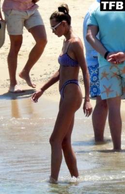 Alina Baikova Displays Her Slender Bikini Body on the Beach on fanspics.com