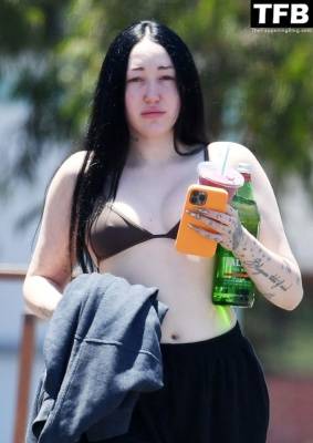Noah Cyrus Slips Into a Bikini Top Cooling Off From the Sweltering Heat with Her Boyfriend in LA on fanspics.com