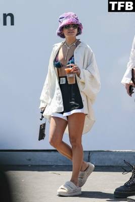Vanessa Hudgens Grabs an Iced Coffee Wearing a Bikini Top on fanspics.com