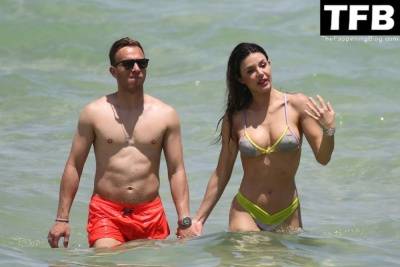 Arthur Melo Hits the Beach with His Girlfriend in Miami on fanspics.com