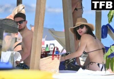 Catherine Harding & Jorginho Frello Enjoy a Day on the Beach in Marbella on fanspics.com