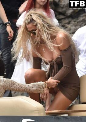 Khloe Kardashian Displays Her Tits and Panties in Portofino on fanspics.com