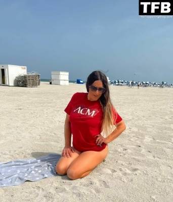 Claudia Romani Supports AC Milan on the Beach in Miami on fanspics.com