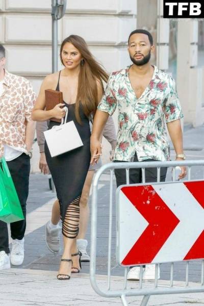 Chrissy Teigen Goes Braless Under a Very Sexy Sheer Black Dress in France - France on fanspics.com