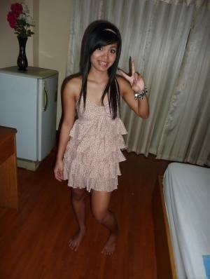 Sweet asian teen babe stripping and getting her hairy poon drilled on fanspics.com