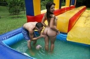 Frisky gals showing off their blowjob skills at the pool party on fanspics.com