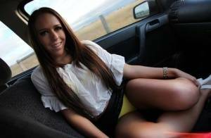 Hitchhiker Kiara Lee flashes a sexy upskirt & gives the driver a blowjob on fanspics.com